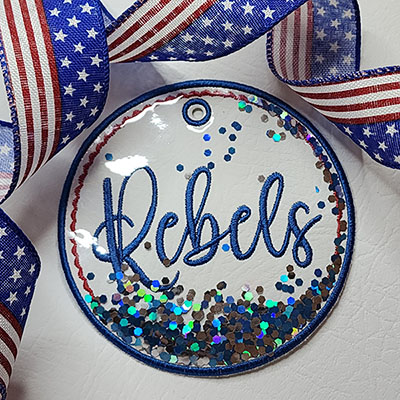 rebels in the hoop bag tag with glitter